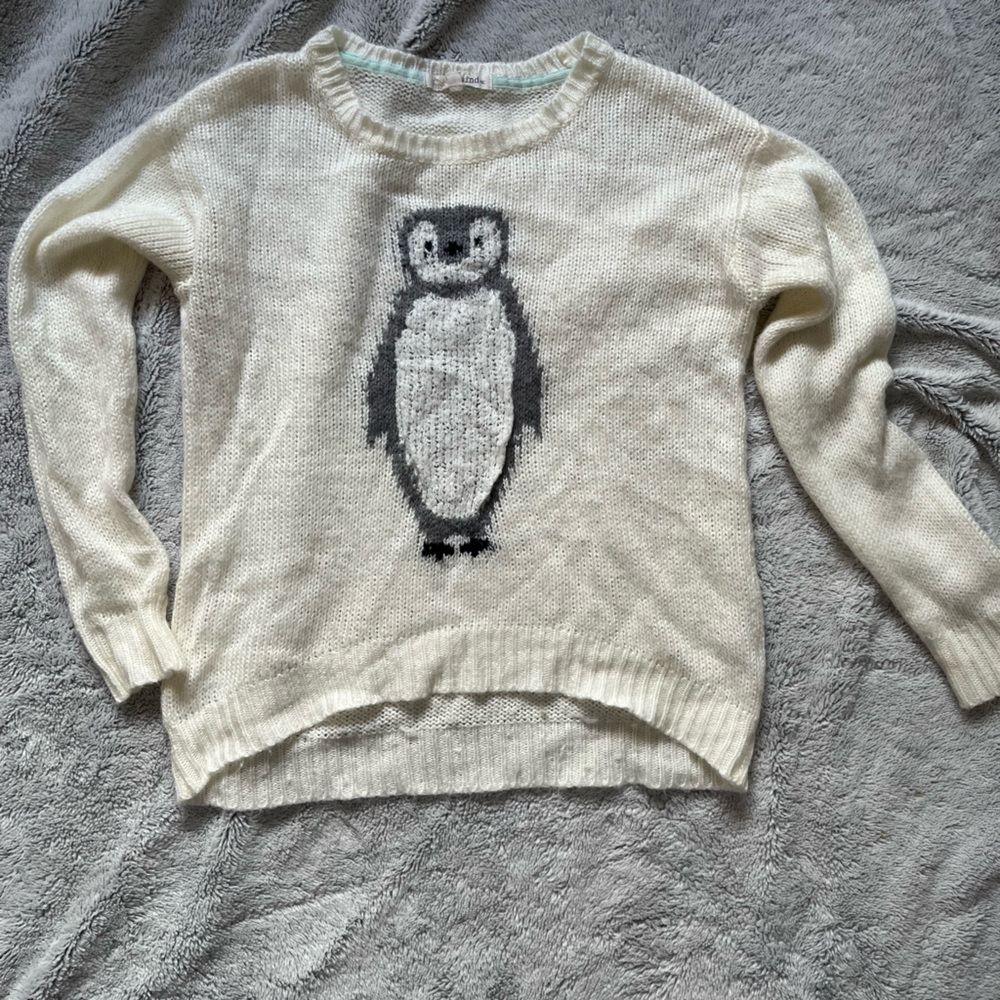 Gently used cutest cream colored penguin sweater women size medium